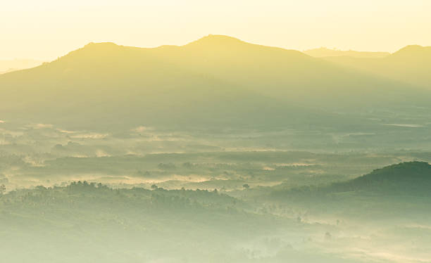 istock Beautiful sunrise at misty morning mountains . 175586253