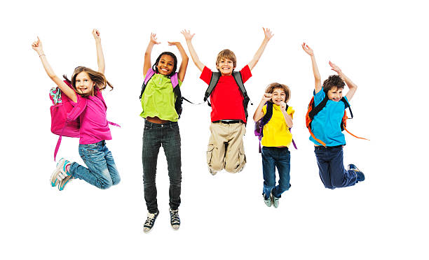 istock School children with backpacks jumping. 175586367