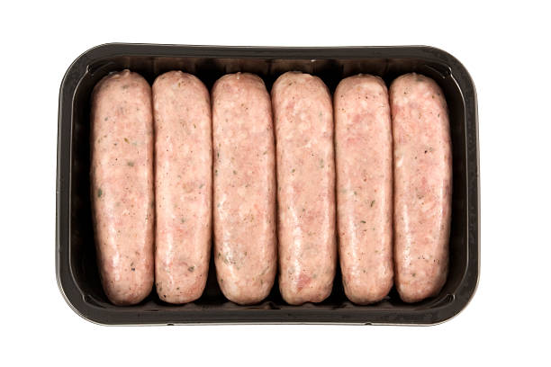 Unwrapped sausages isolated on white