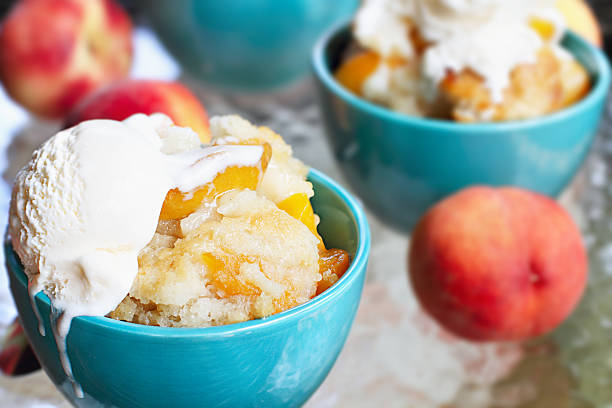 Peach Cobbler and Vanilla Ice Cream stock photo