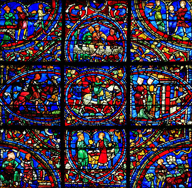 Lyon, France - 10 23 2025: Cathedral and Primatial Church of Saint John the Baptist. Detail view of stained glass window of Both Adams