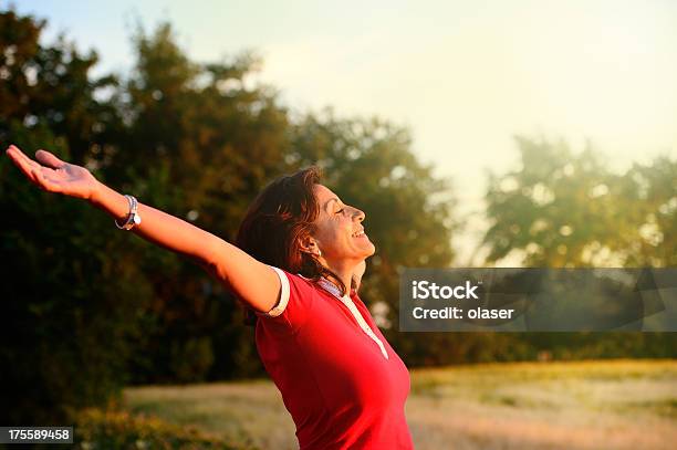 Happy Woman On Field Stock Photo - Download Image Now - 40-44 Years, 45-49 Years, Adult
