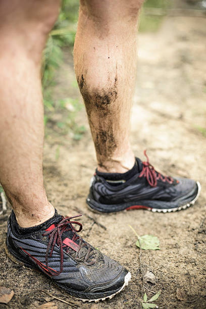 Trail runner legs stock photo