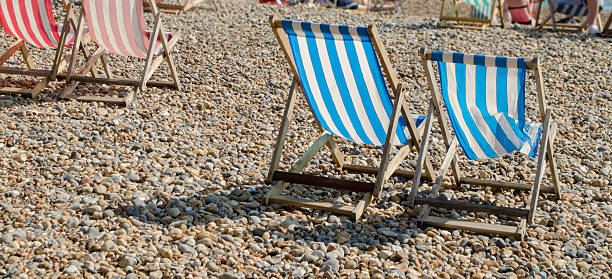 istock Brighton Beach lounge chairs and pebbles 175589826