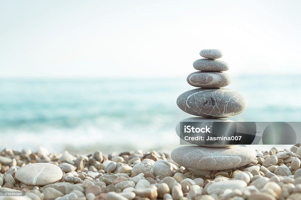Pebble on beach Wellbeing Stock Photo