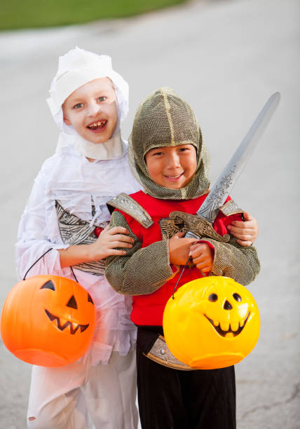istock Children in halloween costumes 175590917