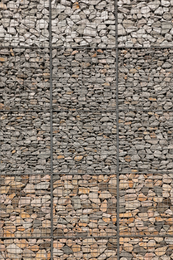 Gabion wall with different kinds of stone in different colours and shapes