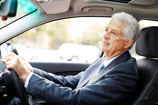 istock Senior Male Business Professional Driving Car 175591421