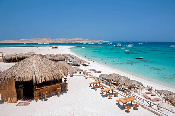 Sandy beach "Beautiful sandy beach on Giftun Island near Hurghada, Red Sea, Egypt. Giftun island is a popular diving site.See my other...." hurghada stock pictures, royalty-free photos & images