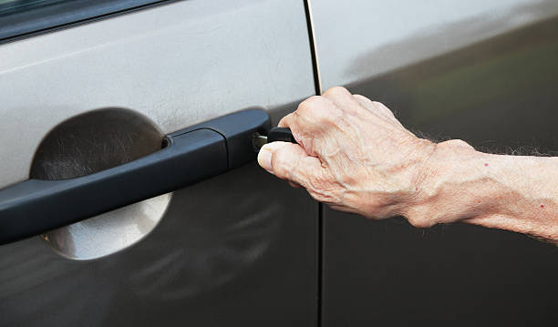 istock Senior Man Hand Unlocking Car Door 175591746