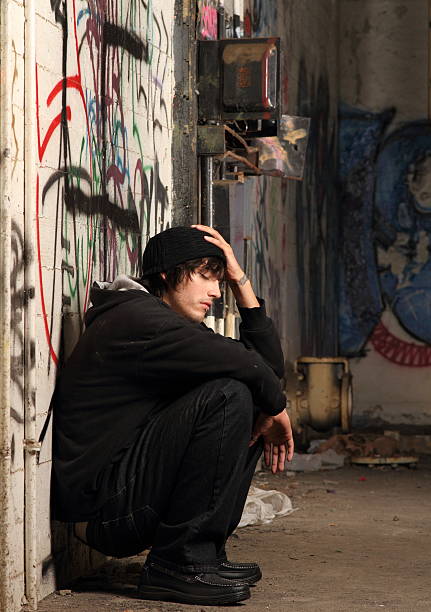 istock Hipster Man in Graffiti Room Squatting 175592091