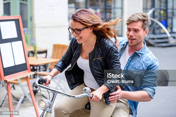Young Couple On A Bicycle Stock Photo - Download Image Now - Dating, Mature Women, Young Men
