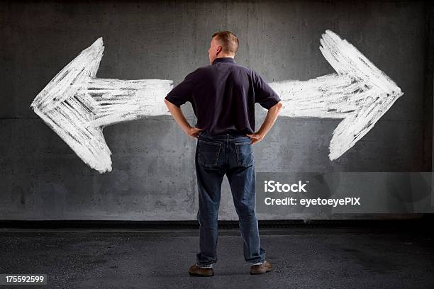 Which Way Do I Go Casual Business Stock Photo - Download Image Now - Adult, Anxiety, Arrow Symbol