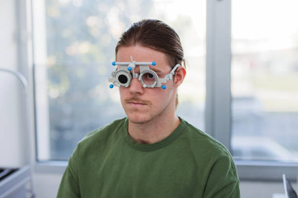 istock Young man at an eye exam, close-up 1755935664