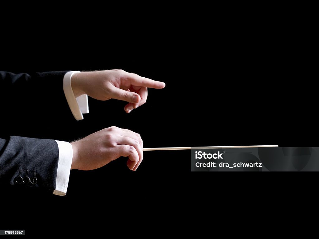 Música conductor señalando - Foto de stock de Orquesta sinfónica libre de derechos