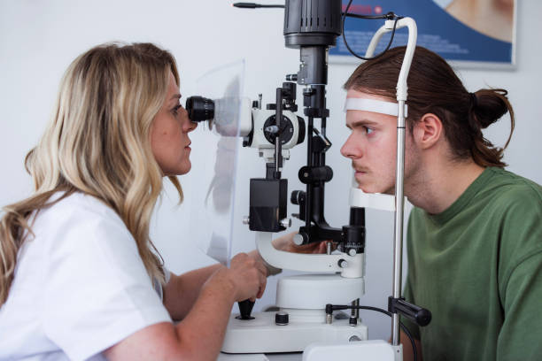 istock Ophthalmologist examining patient with slit lamp 1755937820