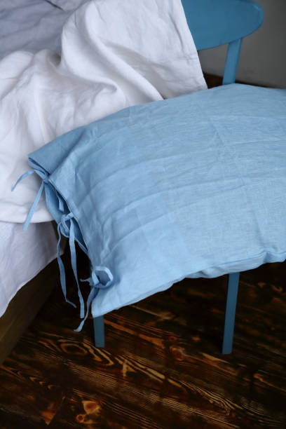 istock Blue linen pillow in bedroom bedclothes white linen 1755937842