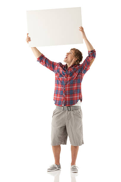28,100+ Man Holding Placard Stock Photos, Pictures & Royalty-Free ...