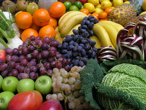 Assortment of fresh fruit and vegetable. Fruits and Vegetables from Edge to Edge: