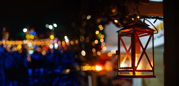 Christmas festive lantern on a fair at night.