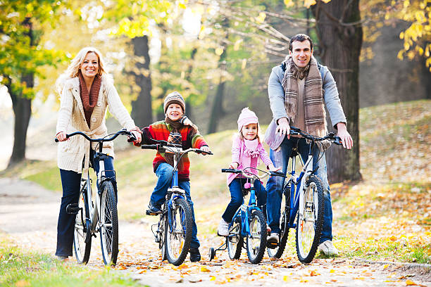 istock Happy family riding bicycles in nature. 175596022