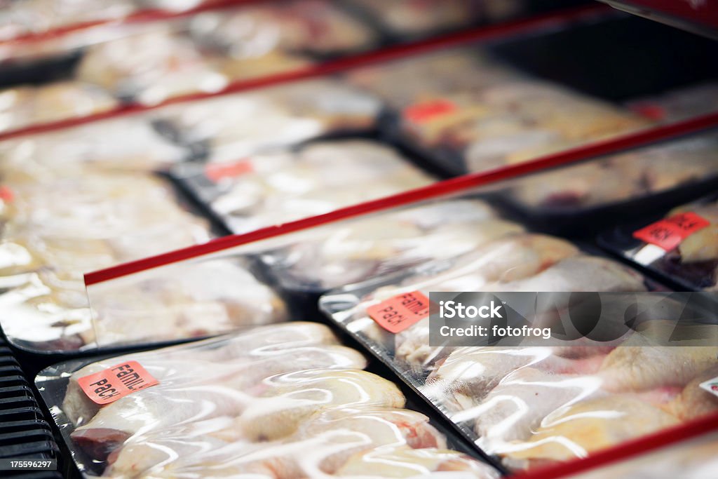 Refrigerated chicken legs in store Packaged chicken legs in store refrigerator. Chicken - Bird Stock Photo