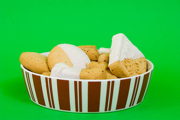 Chocolate coated butter biscuit on white plate