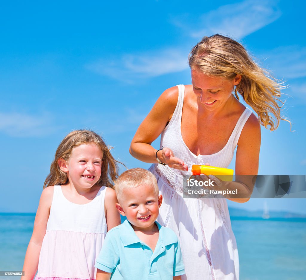 Sun protection on the Beach  Adult Stock Photo