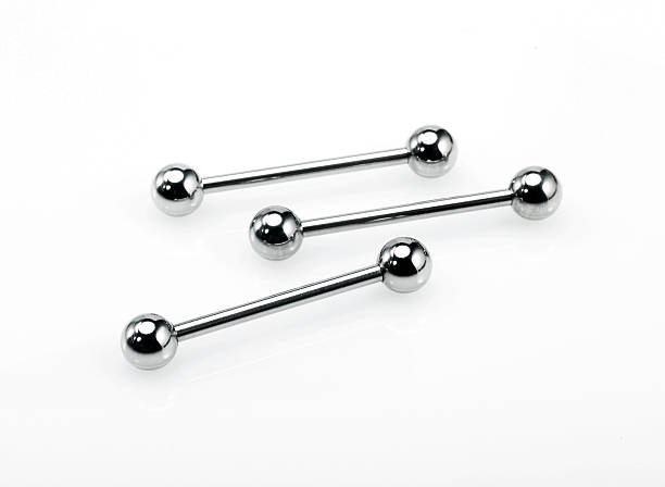 Steel Barbell "Body Jewelry, Three Steel Barbells" piercing stock pictures, royalty-free photos & images