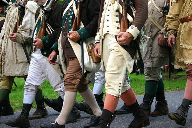 American Soldiers Men dressed up like colonial soldiers in the Battle at the Brandywine reenactment. colonial style stock pictures, royalty-free photos & images