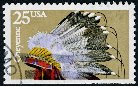 Cancelled Stamp From The United States Featuring A Native American Cheyenne Headdress