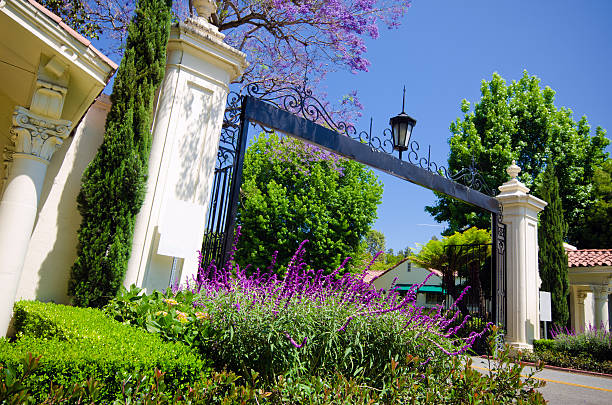 Gate at entrance to Bel-Air in Los Angeles, CA "Gate at entrance to Bel-Air in Los Angeles, CA." bel air photos stock pictures, royalty-free photos & images