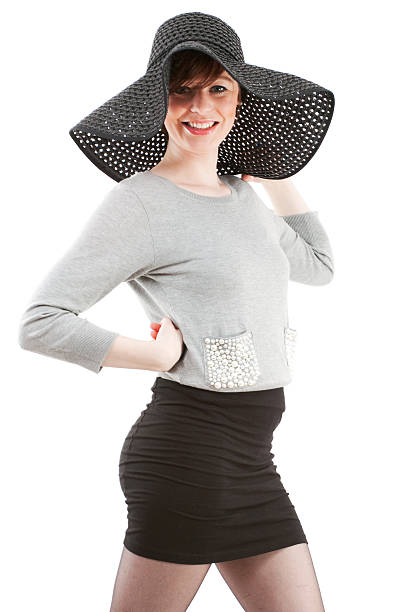 istock Beautiful smiling young woman with large hat 175597566