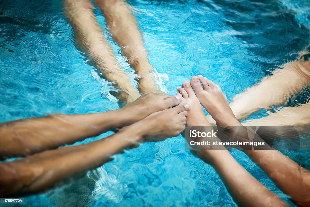 Legs in Pool A group of women in a swimming pool with their legs stretched out in the water...BEACH -  .Exclusive only at istockphoto. Steve Cole Images, Atlanta, Georgia USA - Hot Tub Stock Photo