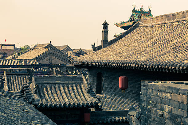 Pingyao, built during the Ming and Qing dynasties, is one of the best preserved ancient cities in China with remaining city walls and ancient houses. Houses in the main streets have been converted as tourist shops, restaurants and guest-houses.