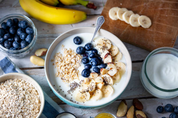 istock Blueberries, banana slices, oat flakes and yoghurt 1755986337
