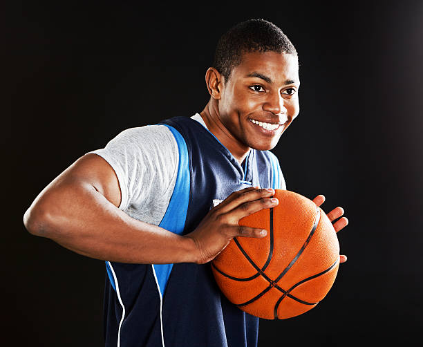 istock Handsome, muscular young basketball player preparing to play 175598743
