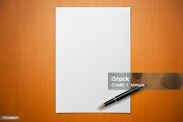 Blank Paper On Desk With A Pen Stock Photo - Download Image Now - Paper, Letter - Document, Pen
