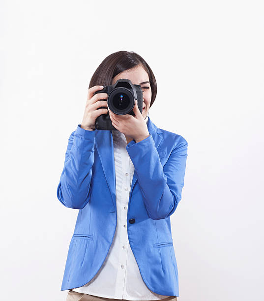 istock young female photographer 175599012