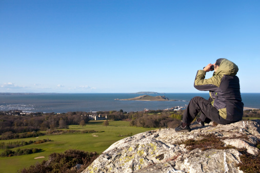 Hiker in Ireland enjoying a breath taking view.