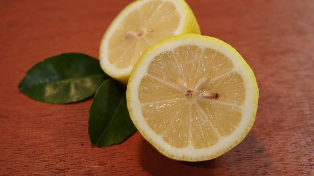 istock sliced ​​lemon fruit on brown wooden board 1756002859