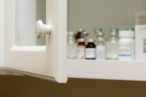 Drugs lined up on a shelf in a physician's office.Need more medical imagery Check out my