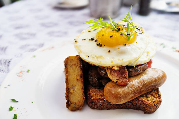 istock Egg, toast, bacon, sausage, mushroom, hash browns makes complete breakfast 175600968