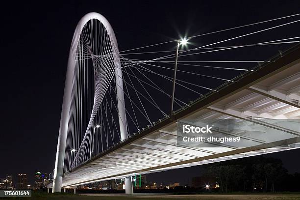 Dallas Suspension Bridge At Night With City Skyline Background Stock Photo - Download Image Now