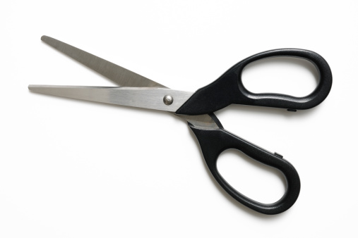 Overhead shot of opened black handle scissors isolated on white background with clipping path.