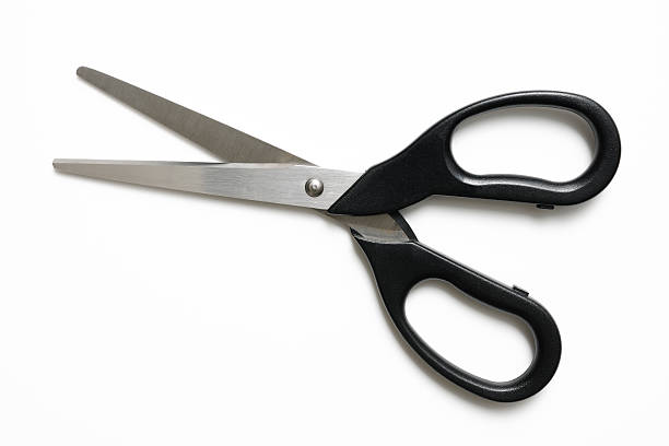 Isolated shot of opened black handle scissors on white background Overhead shot of opened black handle scissors isolated on white background with clipping path. scissors photos stock pictures, royalty-free photos & images