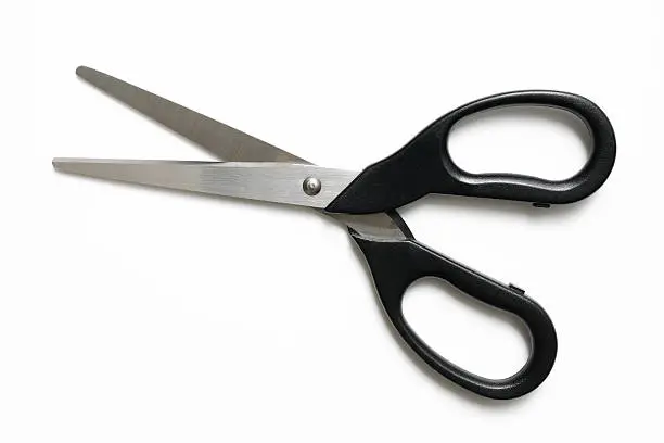 Photo of Isolated shot of opened black handle scissors on white background