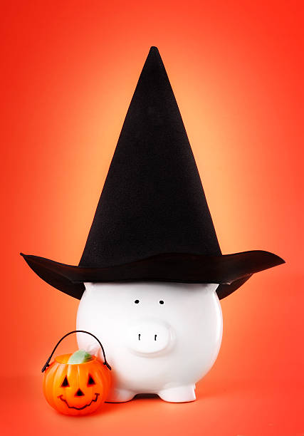 piggy saving for halloween is almost halloween, have you start saving for it? bewitchment stock pictures, royalty-free photos & images