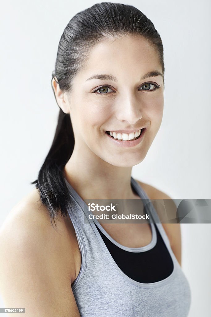 Enjoying the afterglow of a great workout Portrait of a pretty young woman wearing workout gear Active Lifestyle Stock Photo