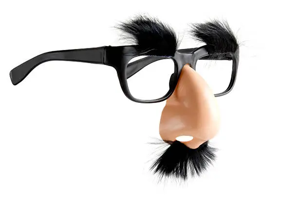 plastic nose and glasses combo isolated on whiteRelated image: